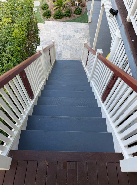 Exterior timber staircase before repainting